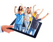 Tablet computer and group of happy people.