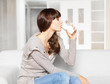 Young woman drinking glass of milk
