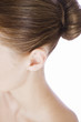 A young woman's ear, close-up