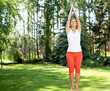 Photo: Young girl in a white shirt and red pants Young girl in a white shirt and red pants