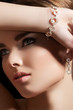 Photo: Accessories, jewelry gold bracelet, earrings with diamonds Accessories, jewelry gold bracelet, earrings with diamonds