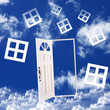 White door against blue sky background White door against blue sky background