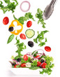 Fresh salad with vegetable in motion. Fresh salad with vegetable in motion.