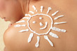 woman with sun-shaped sun cream
