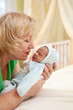 Portrait of mature woman and her newborn grandson