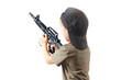 Little boy plays with gun on a white background