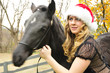 woman with a black horse
