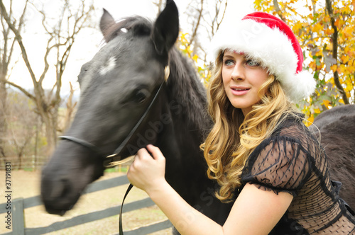 Photo: woman with a black horse woman with a black horse