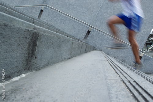 Photo: Fast Man running up stairs Fast Man running up stairs