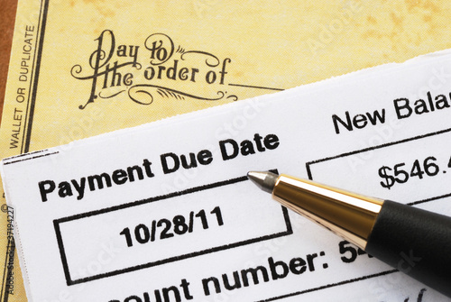 Photo: Paying the credit card bill on time concept of financial health Paying the credit card bill on time concept of financial health