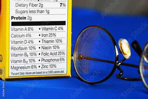 Photo: Focus on the nutrition facts from a box of food Focus on the nutrition facts from a box of food