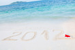 Numbers 2012 on tropical beach sand