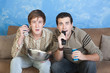 Men on Sofa Edge