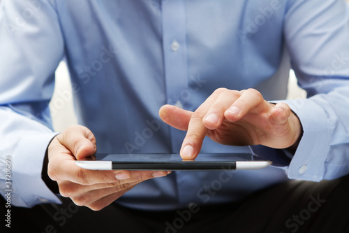 Photo: Working on a digital tablet Working on a digital tablet