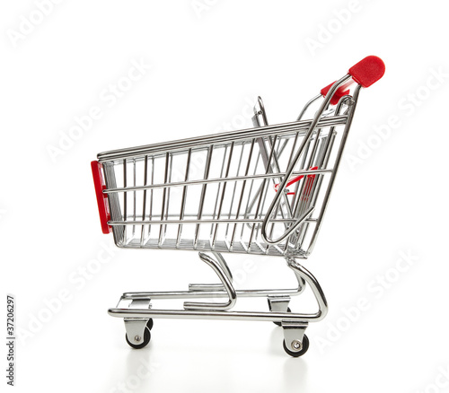 Photo: Shopping cart isolated on white background Shopping cart isolated on white background