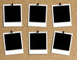 6 verschieden angeordnete Polaroids an Kork Pinwand