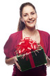 Pretty young woman with present