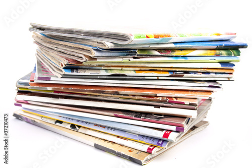 Photo: Stack of magazines isolated Stack of magazines isolated