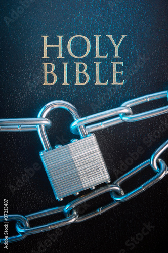 Photo: Bible closed with a chain lock Bible closed with a chain lock