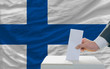 man voting on elections in finland