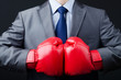 Photo: Businessman with boxing gloves Businessman with boxing gloves