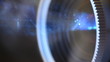 Front view of digital  film projector lens in action.
