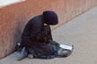 Beggar asks for alms on the street Beggar asks for alms on the street