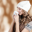 Beautiful girl with a coffee cup