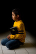 Photo: Child Praying with Bible Child Praying with Bible