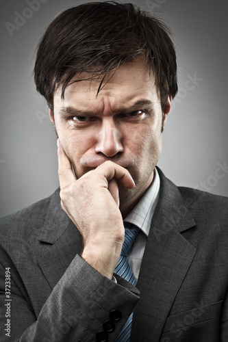 Photo: Thoughtful businessman Thoughtful businessman