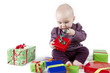 young child unpacking presents