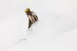 Foto: Snowboarder skiing downhill Snowboarder skiing downhill