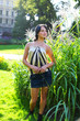 Young girl  in central park at summer