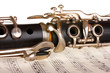 close up detail of clarinet and notebook with notes