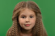 Little cute girl with curly hairs