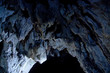 Cave interior with stalagmites and exotic colors