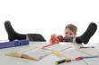 Foto: enfant garçon jouant pendant ses devoirs enfant garçon jouant pendant ses devoirs