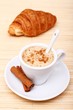 Hot coffee with cinnamon sticks Hot coffee with cinnamon sticks