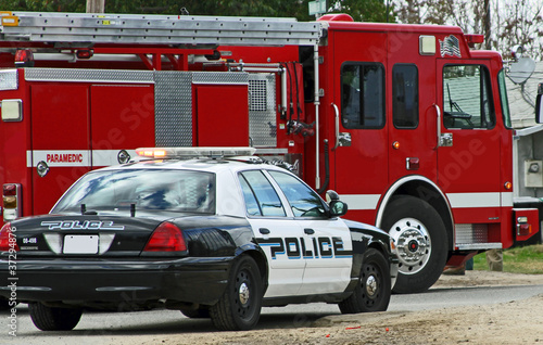 Photo: Police car and fire truck on scene Police car and fire truck on scene