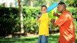 Vídeo: Ethnic Father & Son Practicing Baseball Swing Ethnic Father & Son Practicing Baseball Swing