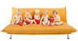 Group of children sitting on sofa and eating popcorn. Isolated w