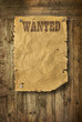 Photo: Wild West wanted poster on old wooden wall Wild West wanted poster on old wooden wall