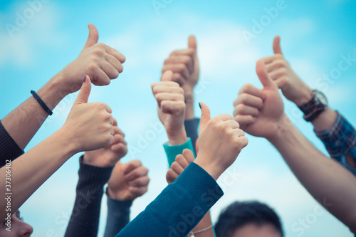 Photo: College Students with Thumbs Up College Students with Thumbs Up