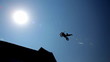 Motorcycle freestyle jump. Silhouette