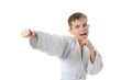 Young boy training karate.
