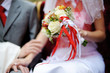 Bride holding white and red wedding flowers bouquet Bride holding white and red wedding flowers bouquet