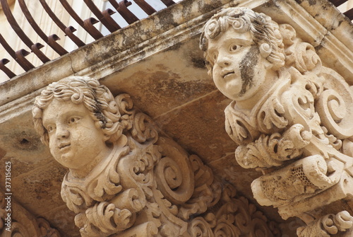 Photo: ornamental angels of balcony, Noto, Sicily ornamental angels of balcony, Noto, Sicily