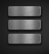 three metal plates over grid background three metal plates over grid background
