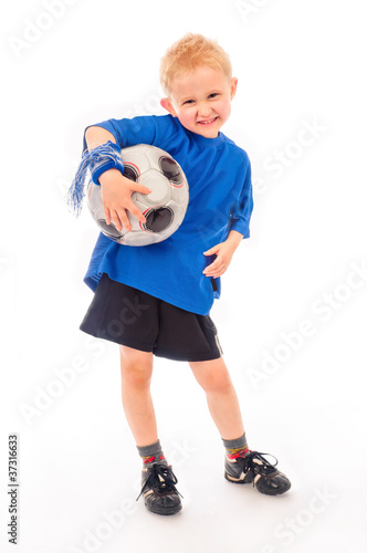 Foto: Junger Fussballspieler Junger Fussballspieler