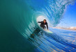 Surfer on Blue Ocean Wave in the Tube